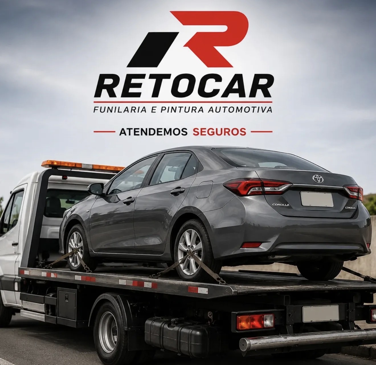 Veículo sendo transportado por guincho para a oficina Retocar